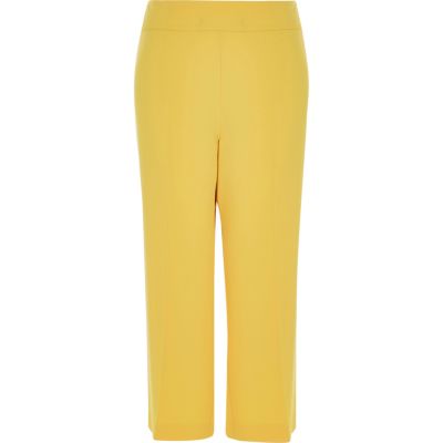 RI Plus yellow cropped smart trousers